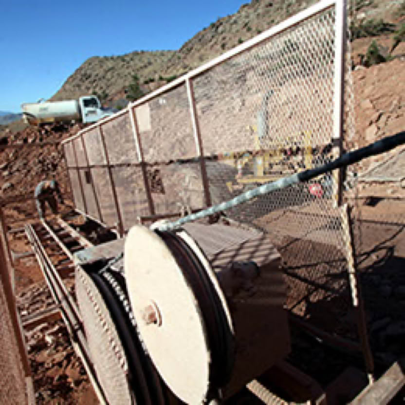 A man working the side heavy equipment
