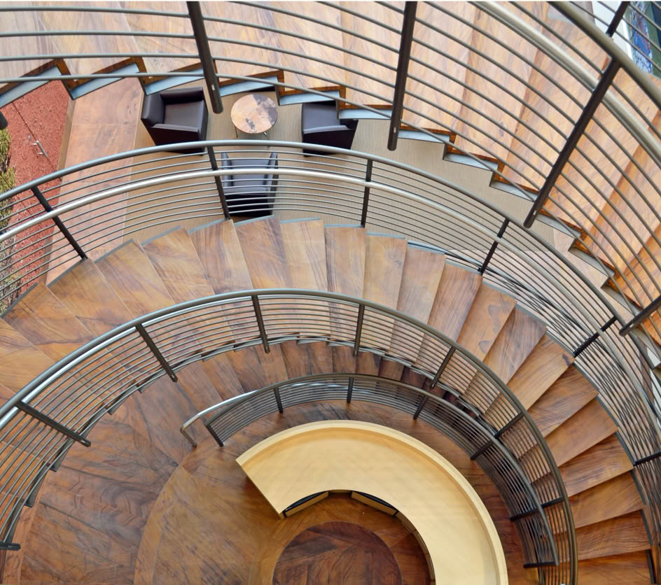 Looking down spiral staircase made of stone